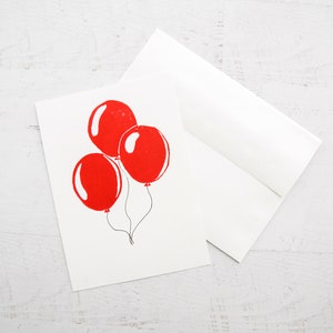 Tarjeta Linocut globos rojos