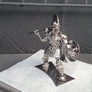 Spartan Throw Handmade Metal Recycled sculpture Metal Art Productions