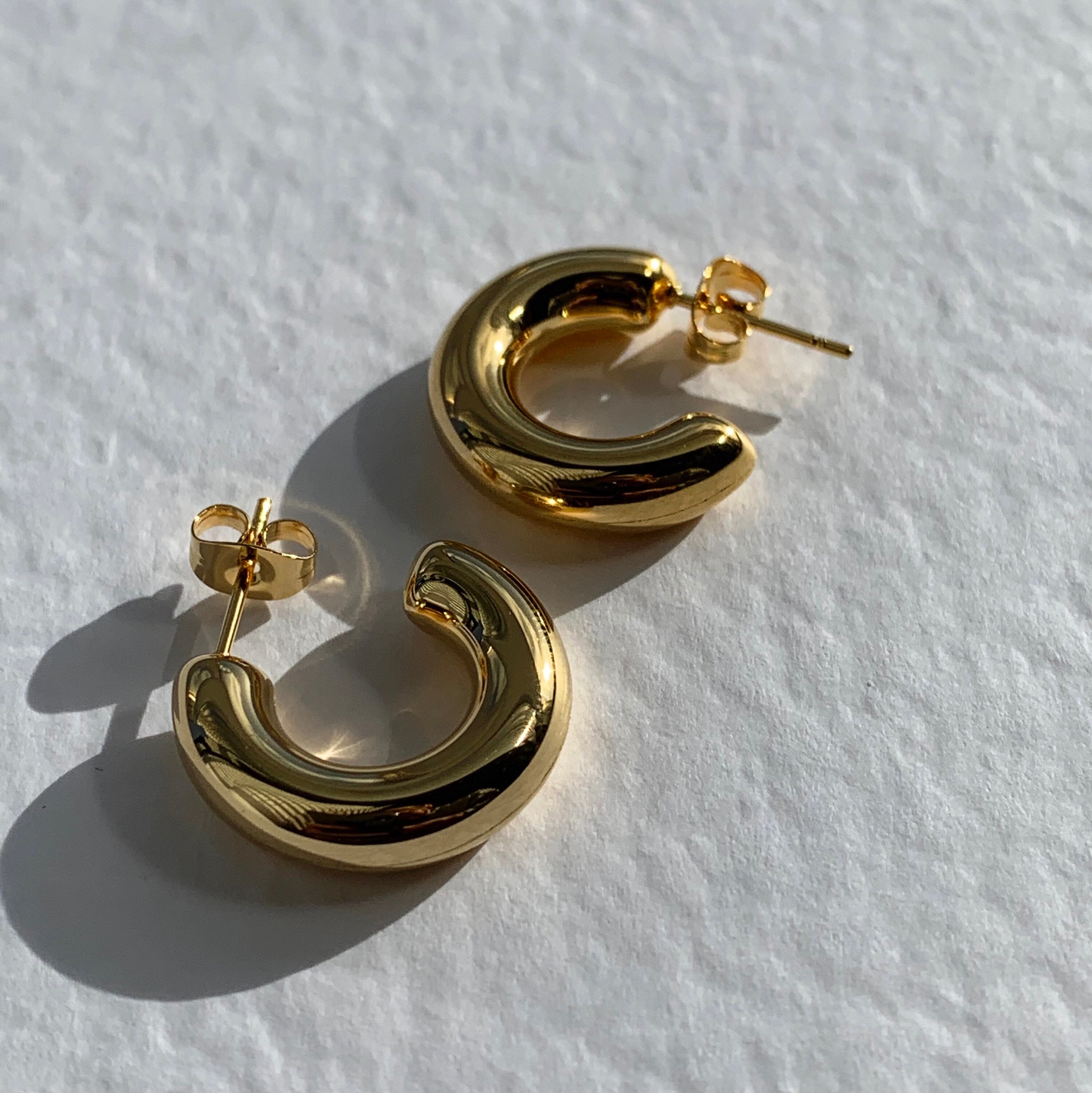 Thick half on sale hoop earrings