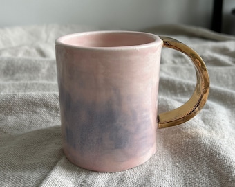 Porcelain mug with gold accent