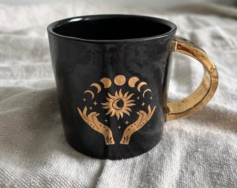 Mug in Black with gold accents