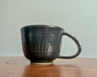 black mug with large handle