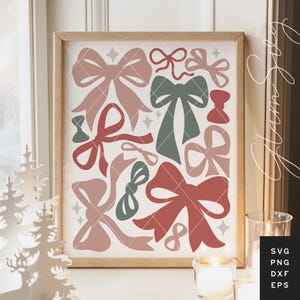 May include: A framed print featuring a collection of stylized bows in shades of dusty rose, muted teal, and brick red. The bows are arranged on a cream background with a subtle diamond pattern. The frame is a light wood color.