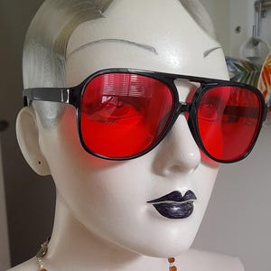 Classic retro black frame square sunglasses with vivid intense red lenses ibiza poolside party festival shades punk pop fashion sunglasses