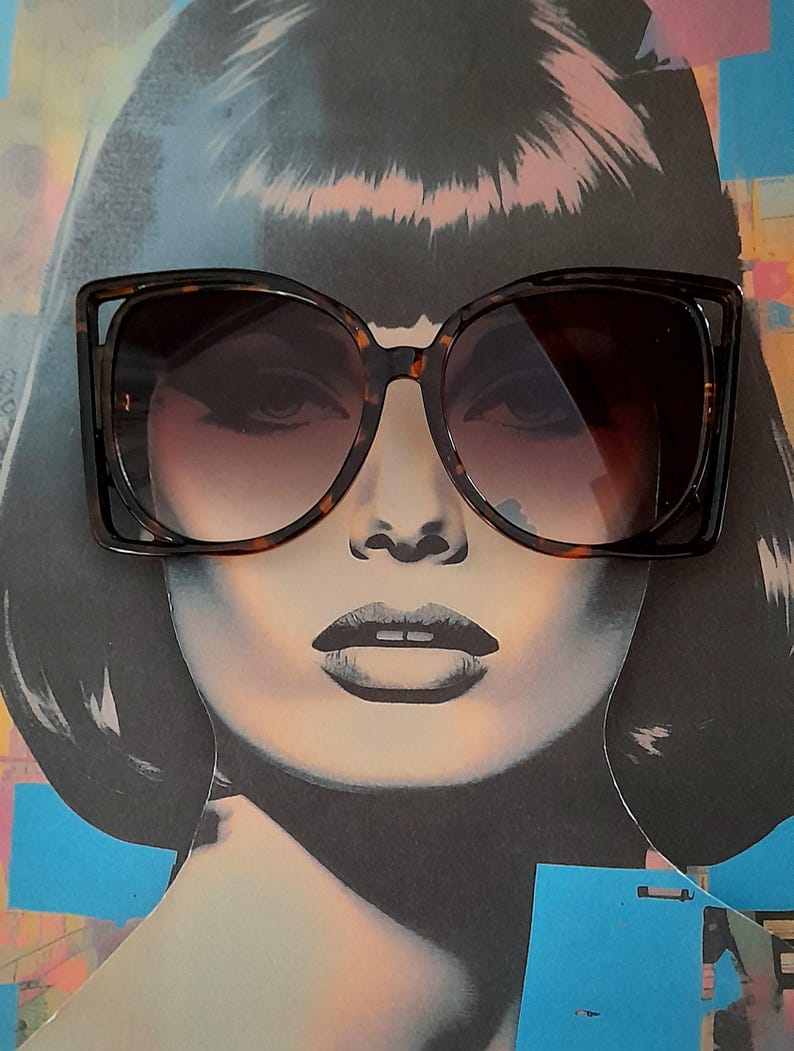 May include: Large, square-framed sunglasses with a tortoiseshell pattern. The sunglasses have dark lenses and are set against a pop art style image of a woman's face. The overall aesthetic is retro and stylish.