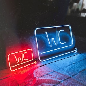 Insegna al neon per bagni WC / Decorazione da parete con freccia di navigazione per aziende: scegli il colore, la dimensione e controlla la luminosità!