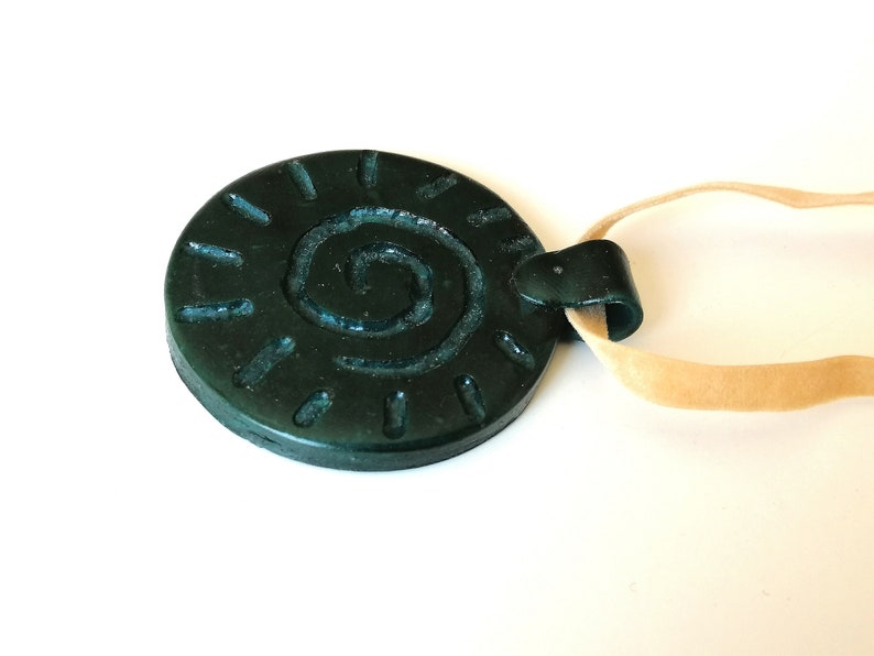 Ochre disc pendant for the Summer Celtic design velvet ribbon