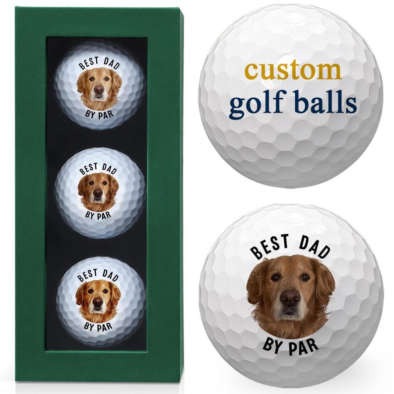 three golf balls with a dog's face on them, each labeled "Best Dad By Par".