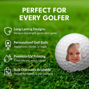 a golf ball with a young girl's face on it, set against a grassy background.