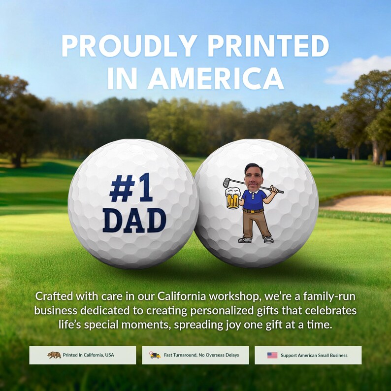 The image is an advertisement for a golf-themed gift, featuring two golf balls with personalized messages. The text on the golf balls reads "Proudly Printed in America" and "#1 DAD", indicating the golf balls are personalized gifts for a father. The advertisement also mentions that the gifts are created with care in California, and the company is a family-run business dedicated to creating personalized gifts for special moments.