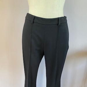 Vintage Prada wool pants with front seam. Gorgeous Prada black pants with side zip closure.