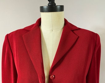 Vintage Travis Ayers deep red suit with a side slit pencil skirt. Size 4.
