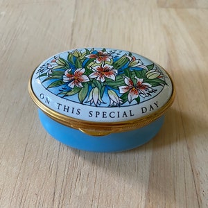 Staffordshire Enamels hand painted Trinket box. Inscribed With love and good wishes on this special day.