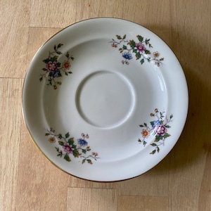 Pillivuyt et Cie porcelain saucer circa 1860. Hand painted. Excellent condition.