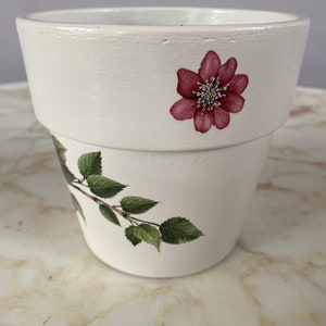 Hand painted terracotta plant pot. Painted in Benjamin Moore Featherstone with PrimaDesign Transfers.