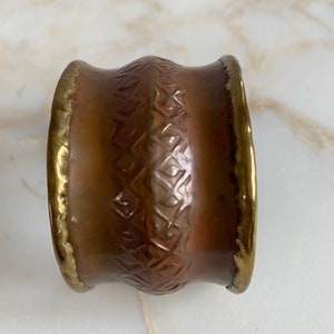 Vintage copper and brass handmade cuff bracelet. Circa 1970.