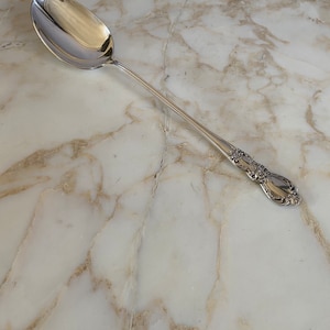 Large vintage silver plate serving spoon by 1847 Rogers Bros Heritage Pattern. Circa 1950. 13” long.