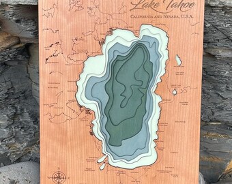 Lake Tahoe laser cut framed 3D topographical map with depths mountains rivers and roads.