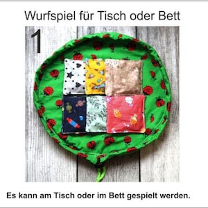 Throwing game table game tactile stimulation fabric bag cherry stone pillow dementia Alzheimer's ADHD autism seniors patients children throwing bag