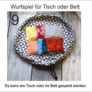 Throwing game table game tactile stimulation fabric bag cherry stone pillow dementia Alzheimer's ADHD autism seniors patients children throwing bag