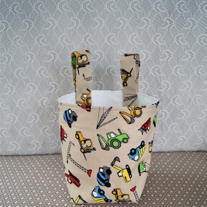 Lenkertasche Utensilo beige Baufahrzeuge Bagger Spielzeugtasche Aufbewahrung Kinderbett Schnullertasche Laufrad Roller Deirad Osterkorb