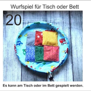 Throwing game table game tactile stimulation fabric bag cherry stone pillow dementia Alzheimer's ADHD autism seniors patients children throwing bag