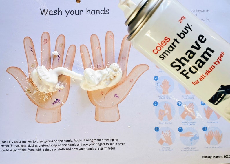 May include: A white poster with the words "Wash your hands" printed on it. Two cartoon hands are shown with white shaving cream on them. A can of Coles Smart Buy Shave Foam is shown in the upper right corner of the image.