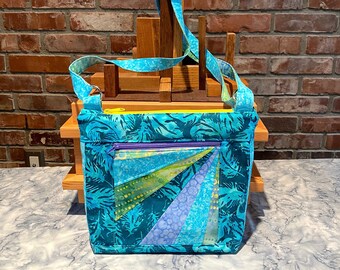 Julicita Rainbow Crossbody Bag "Tealfeather" in turquoise, blues, greens, and lavender with radial array accent panel