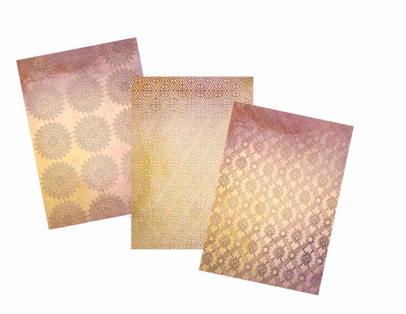 May include: Three decorative paper sheets with a gold and pink color scheme. Each sheet features a different intricate pattern.