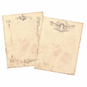 May include: Two blank, lined, vintage-style paper sheets with decorative borders. The top sheet has a scroll-like design with a floral motif. The bottom sheet has a more ornate design with a cherub at the top.