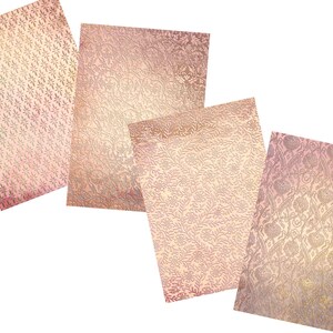 May include: Four sheets of decorative paper with a pink and gold floral pattern. The paper has a textured, embossed look.