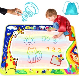May include: A colorful, multi-purpose play mat with a rainbow design. The mat features a giraffe, a cat, a butterfly, a sun, numbers, and letters. The mat is made of a water-resistant material and can be used for drawing, writing, and playing games. The mat comes with a set of water-based markers.