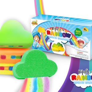 May include: A selection of cloud-shaped bath bombs in green, orange, and yellow, with a rainbow design. The packaging displays the text "Make a Rainbow Bath Bombs" and "100% Natural".