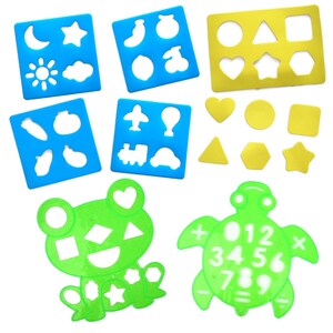 May include: A set of 10 blue and green plastic stencils for kids. The stencils feature shapes, numbers, and letters. The stencils are perfect for arts and crafts projects.