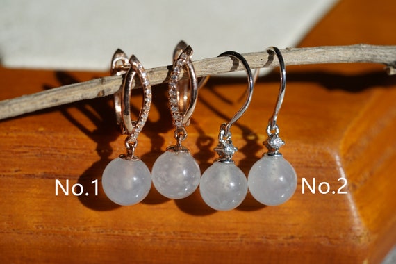 Orecchini di magnolia di giada bianca Pietra preziosa Zircone Donne naturali Fascino di cristallo Regali di calcedonio Amuleto Gioielli fortunati Moda 36 Orecchini di magnolia di giada bianca Pietra preziosa Zircone Donne naturali Fascino di cristallo Regali di calcedonio Amuleto Gioielli fortunati Moda 36