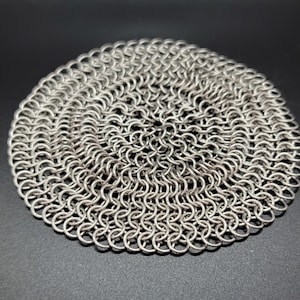 Stainless Steel Chainmaille Scrubber. Two sizes to choose from 5 inches and 7 inches.