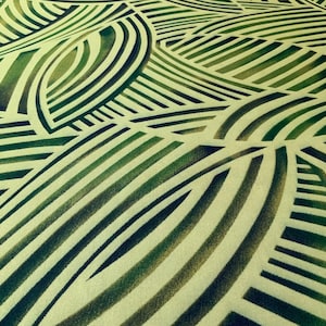 May include: Abstract pattern with green and white stripes and curves. The pattern is reminiscent of a woven fabric.