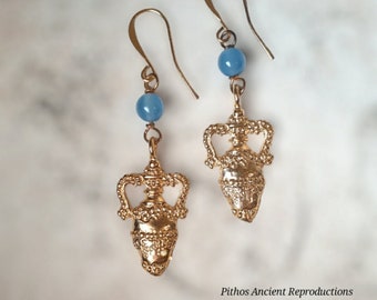 Antique style earrings in the shape of an amphora with turquoise stone. Craftsmanship.