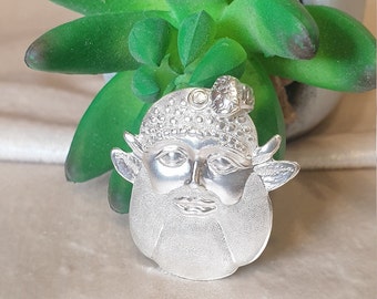 Reproduction Achelous face pendant in brass, silver bath.