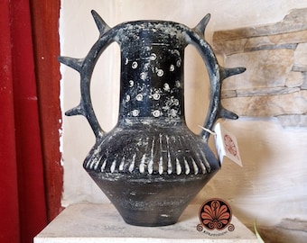 Reproduction of Etruscan vase in Bucchero. Made with the same techniques used in ancient times.