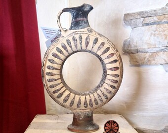 Reproduction of Etruscan Corinthian black-figure Oinochoe vase. Height 23.5 cm.