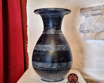 Reproduction of Olpe vase in graffitied bucchero. Height 23 cm.