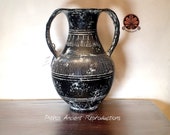 Reproduction vase Amphora Nicostenica Etruscan in graffito bucchero with openwork handles. Height 23,5 cm