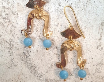 Antique style earrings with two dangling light blue jade stones, depicting a snake. Nickel free.