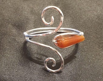 Silver wet wrought copper bracelet, with double spiral and carnelian stone