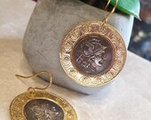 Brass earrings with gold bath. Reproduction Moneta Roma Elmata. Craftsmanship