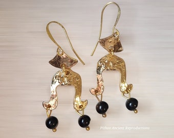 Antique style earrings with two hanging onyx stones, depicting a snake in the centre. Nickel free.