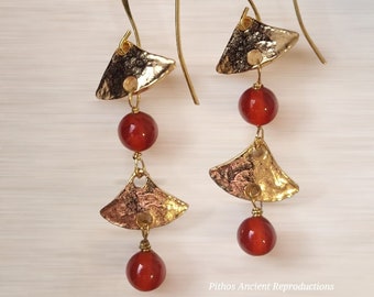 Antique style earrings and craftsmanship with two carnelian stones. Nickel free.