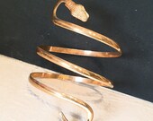 Snake bracelet to the slave in brass wet with gold, craftsmanship.