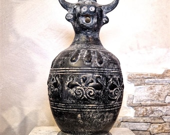 Reproduction of a Chiusino-style heavy bucchero oinochoe. Made using the same ancient techniques.